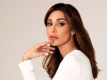 Belen Rodriguez innamorata più che mai: arriva il bacio appassionato con Elio