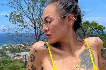 Grande Fratello, scatta il bacio sotto le coperte, Rosy Chin si lascia andare, la reazione del marito  – FOTO