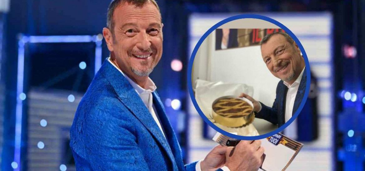 Amadeus ad Affari Tuoi. Nel cerchio: Amadeus con una pastiera.