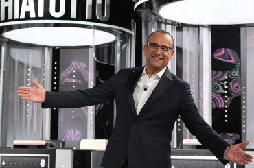 I segreti dietro la televisione, Carlo Conti e il suo passato da bancario